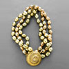 Isabel Canovas triple strand pearl bracelet