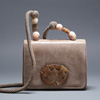 Raphael Sanchez beige flap front skin handbag